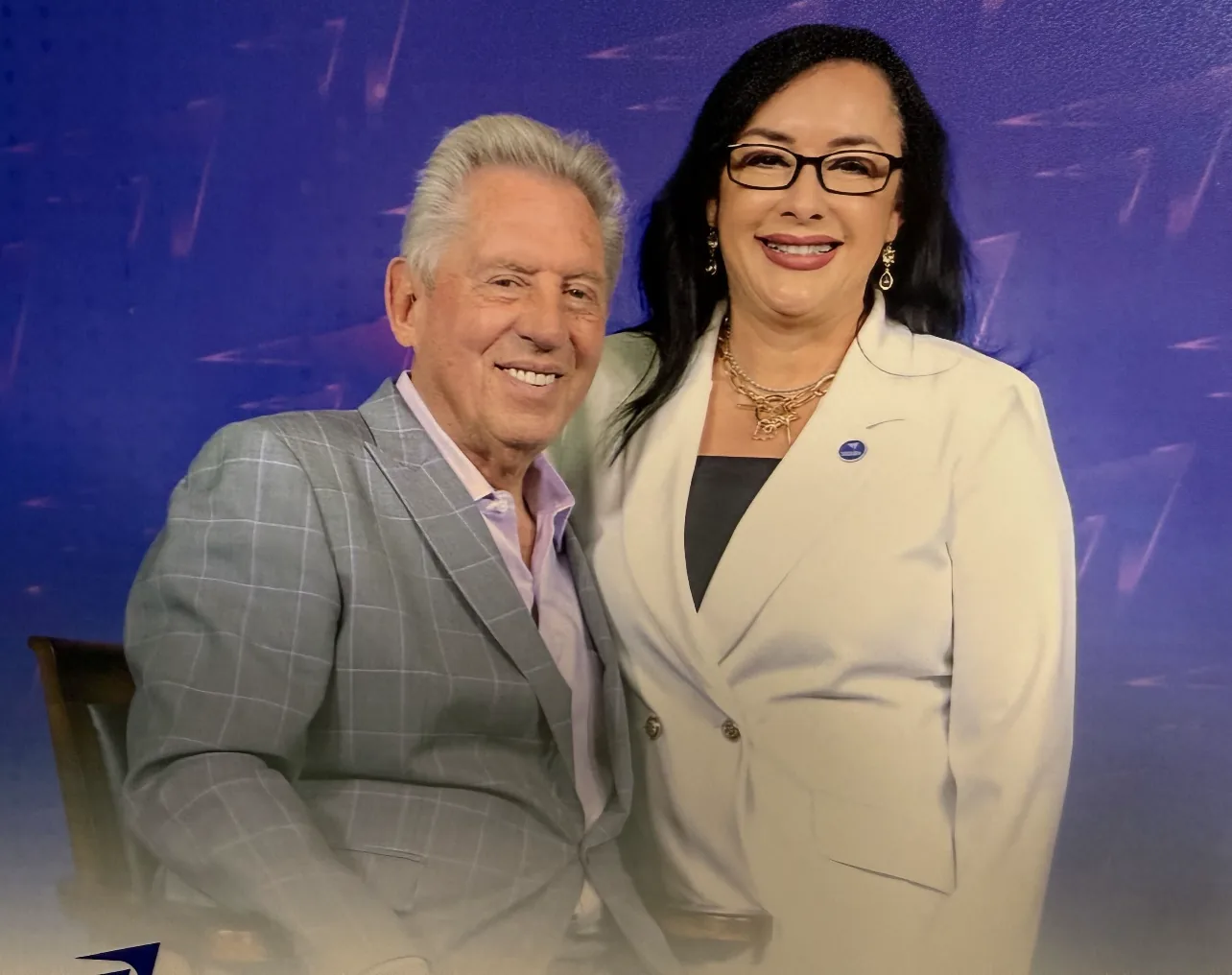 Blanca Criner standing with John C. Maxwell